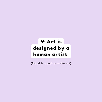 A white die-cut sticker with the text 'Art is designed by a human artist' and '(No AI is used to make art)' in black lettering, centered on a solid light purple background.