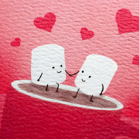 Illustration of two smiling, personified marshmallows holding hands while sitting on top of the rim of a cup of hot chocolate, surrounded by red floating hearts on a textured red and pink ombre background.