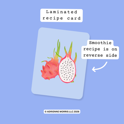 A laminated recipe card featuring an illustration of a dragon fruit, with text labels indicating the laminated recipe card and that the smoothie recipe is on the reverse side, set against a solid periwinkle blue background.