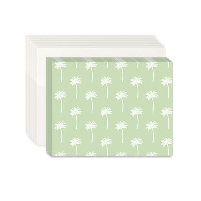 A stack of eight white envelopes and eight notecards with a green palm tree pattern on the notecards. The stationery set is centered on a white background