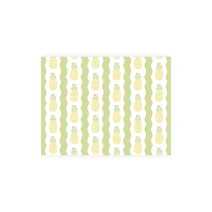 A single notecard featuring a pattern of vertical rows of stylized pineapples. The pineapples have a yellow crisscross diamond pattern with green leafy tops, set against alternating white and green wavy vertical stripes. The patterned horizontal card is centered on a white background.